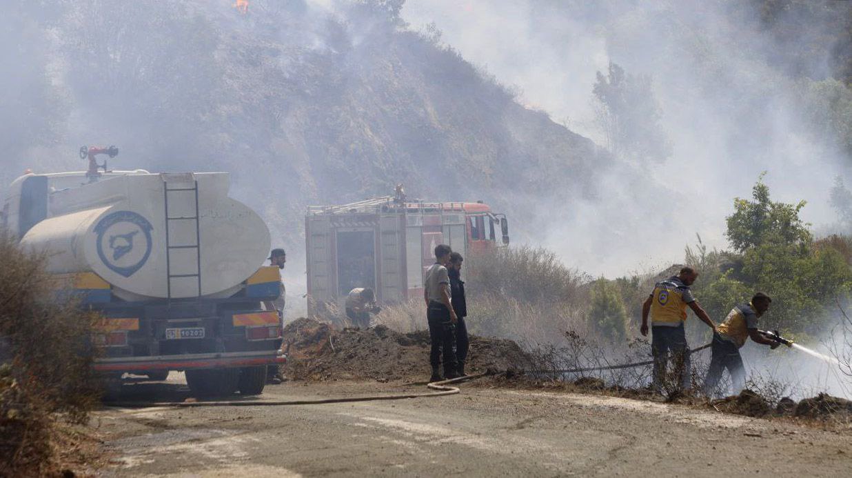 Syria battles forest fires for third day as Turkey sends help